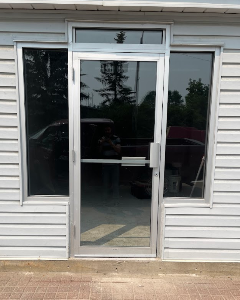 A custom glass door installation
